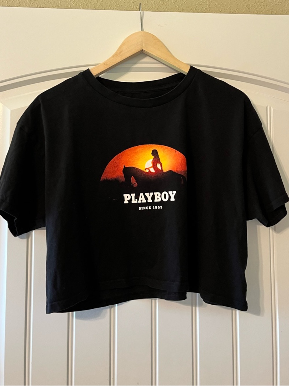 PLAYBOY Black Crop Tee with Orange Sunset Horse Graphic